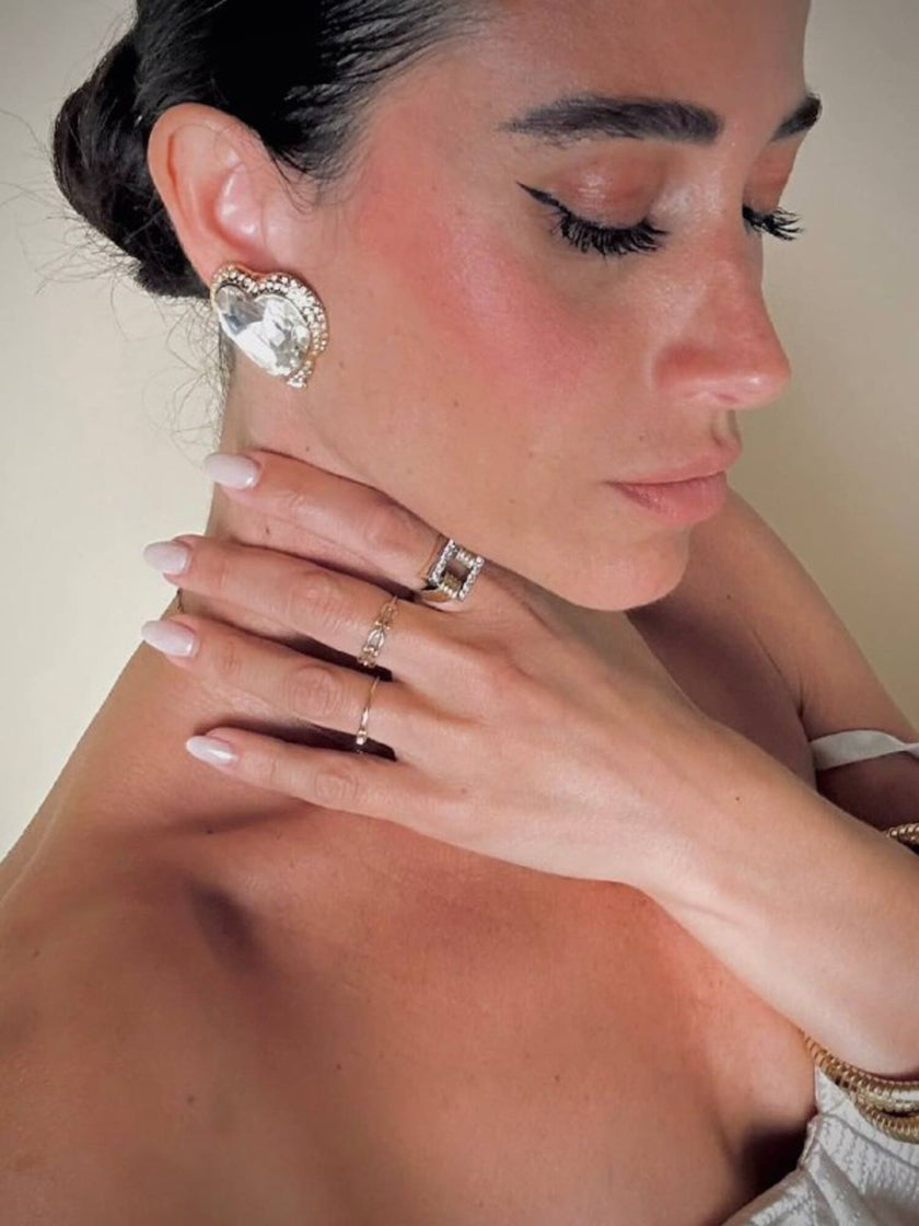 Clip oro con maxi cristalli a forma di cuore “Yves Saint Laurent”