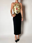 Top vintage con schiena nuda in pelle laminata oro