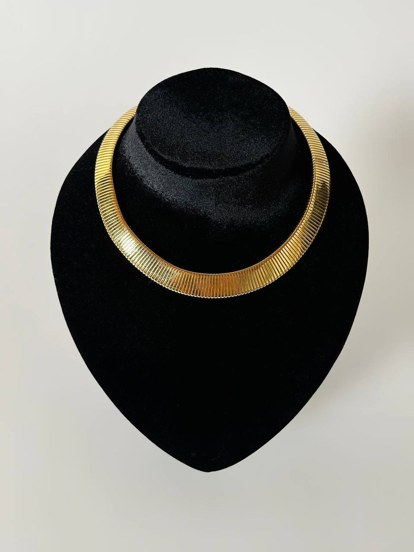 Collier tubogas vintage Cascio in metallo dorato