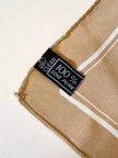 Foulard in seta beige con profili e logo bianchi “Yves Saint Laurent”