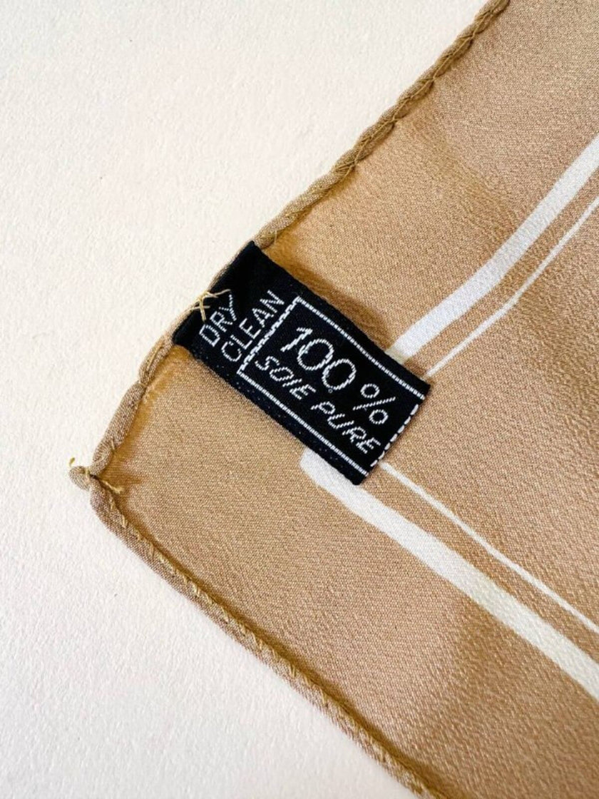 Foulard in seta beige con profili e logo bianchi “Yves Saint Laurent”