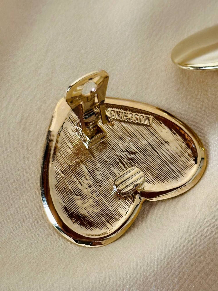 Maxi clip dorate a forma di cuore “Moschino”