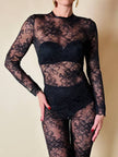 Jumpsuit con staffe in pizzo nero “La Perla”