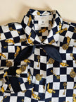 Camicia in raso di seta a scacchi con fiocco al collo “Escada”