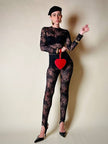 Jumpsuit con staffe in pizzo nero “La Perla”