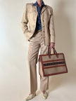 Pantalone sartoriale con piega e abbottonatura frontale color cammello chiaro