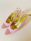 Slingback in pelle rosa con punta traforata “Valentino Garavani” by René Caovilla