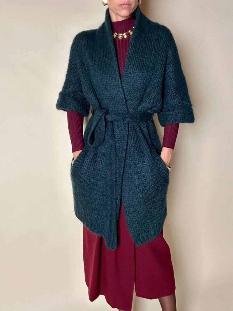 Cardigan Carven in lana verde con manica a tre quarti e cintura in vita