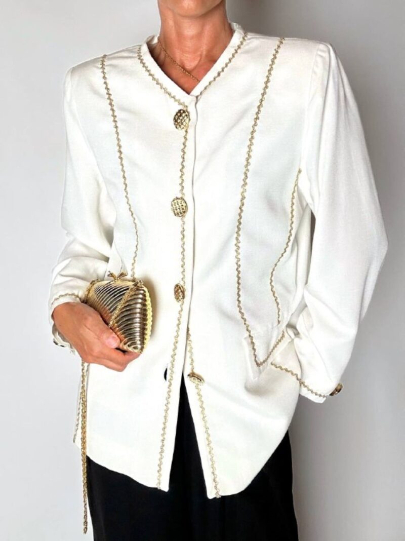 Giacca vintage Yves Saint Laurent bianco latte con serpentine dorate e bottoni gioiello